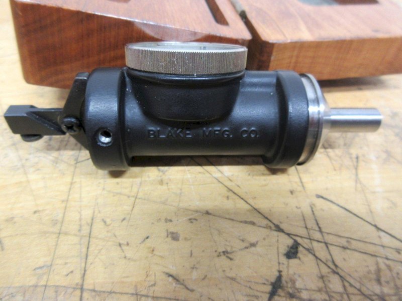 Blake Mfg. Coaxial Indicator .0005" Increments, .125" Travel Range, 1-3/8" Face with Stylus Points in Wood Case- Auction Item
