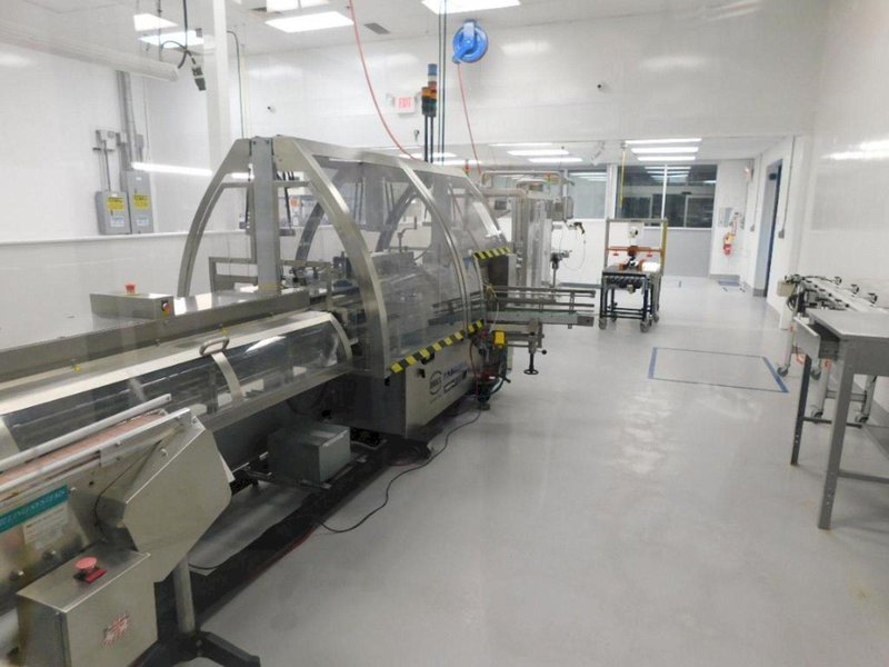 IWKA Fabrima Semi-Automatic Continuous-Motion Vertical Cartoner, Model VP-120, 2005 – Allen Bradley PanelView 600 Control – 8″ Centers, 2005