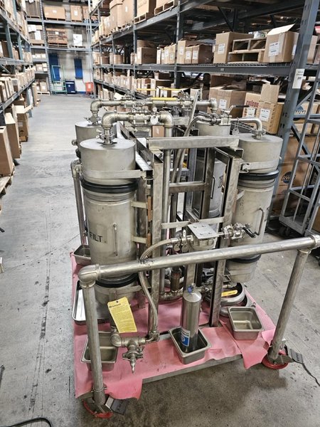 Accutek Bottling Line with Chadam Consultants 2 Head Gravity Filler, Accutek SA-1 Automatic Chuck Capper, Accutek APS106 Labelette Labeler, Everfilt Oil Filtration System, IBC Tanks