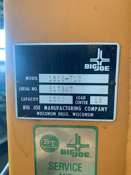 1,500 LB BIG JOE 1518-T-12 ELECTRIC LIFT. STOCK # 0873824