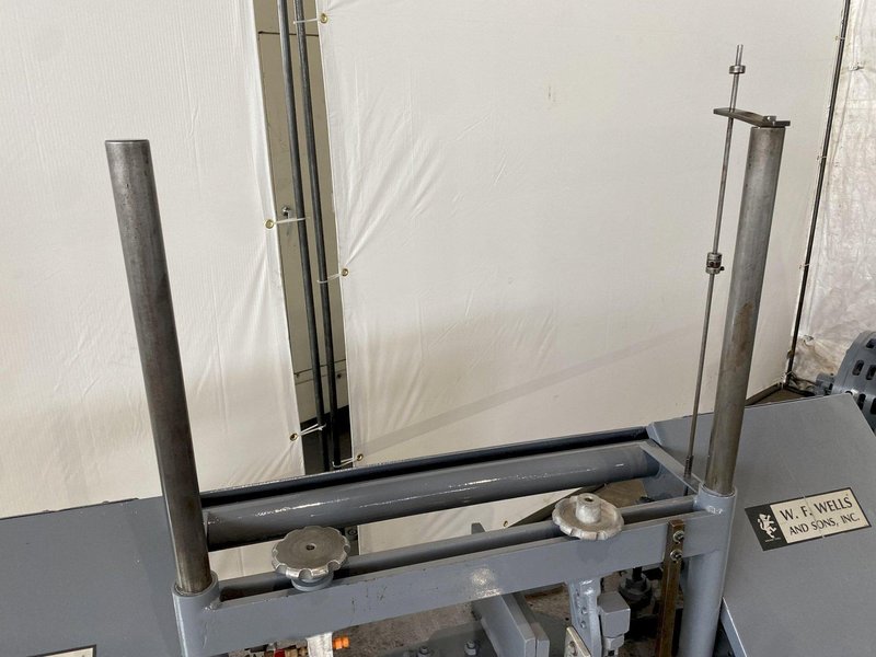 9" x 18" W. F. WELLS HORIZONTAL BANDSAW w/ DUAL COLUMNS. STOCK #0741422.