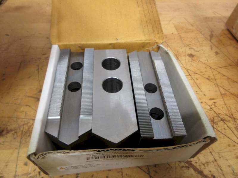 3-Jaw Chuck 1.5mm x 60 Deg Serrated Aluminum Pie Jaws (2 Sets), and Steel Jaws (1) Set- Auction Item