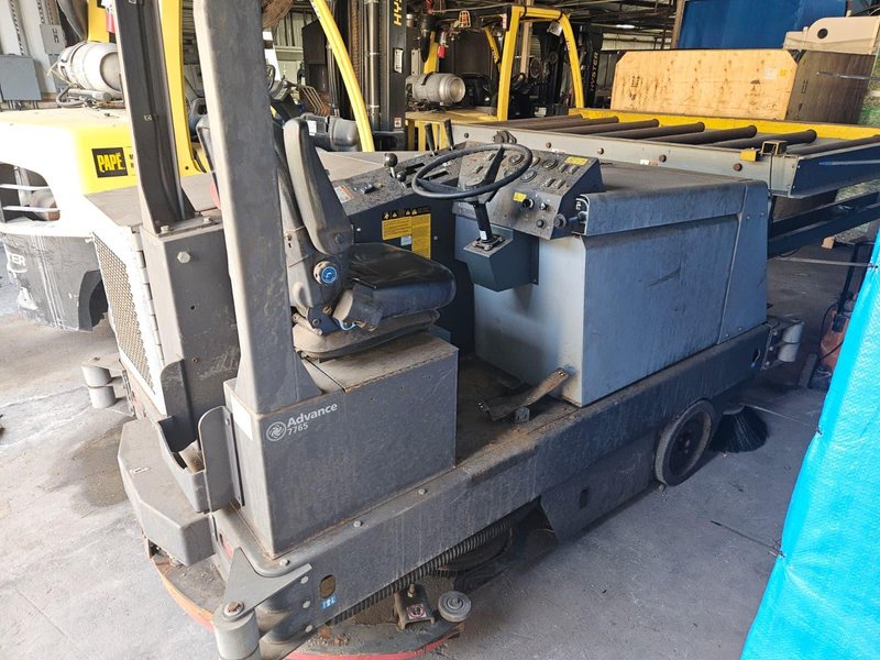 Advance 7765LP Industrial Ride-On Floor Sweeper Scrubber, 2022 – 54-Inch Scrub Path – LPG
