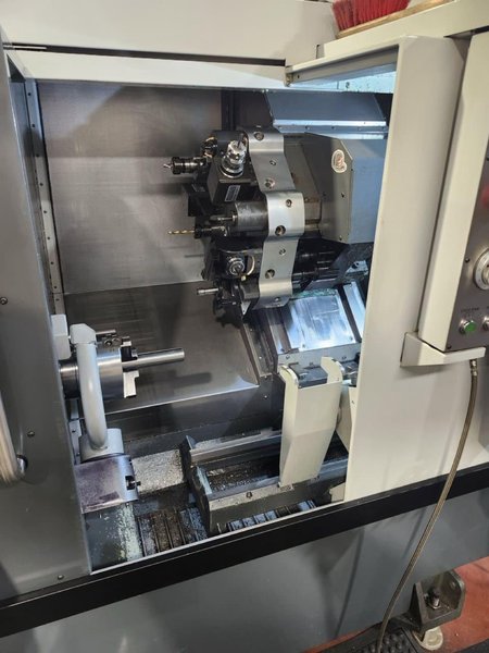 Haas ST-10Y Multi Axis CNC Lathe, 2017  – Chip Conveyor, Tailstock, C-Axis, Tool Presetter, Bar Feeder, Live Tooling