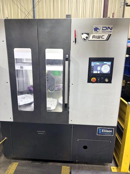 Doosan DVF 5000 5-Axis VMC, 2022 – 18K Spindle, 120 ATC, Through Spindle Coolant/Air, 8 Pallet Changer, Probing, Mist Collector, Conveyor