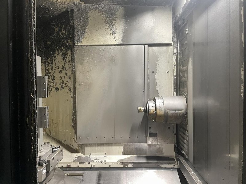 DMG Mori NHX5000 CNC Horizontal Machining Center with Pallet Changer, High Pressure Thru-Spindle Coolant, 60 Station Tool Changer, 50 HP High Torque 15,000 RPM Spindle
