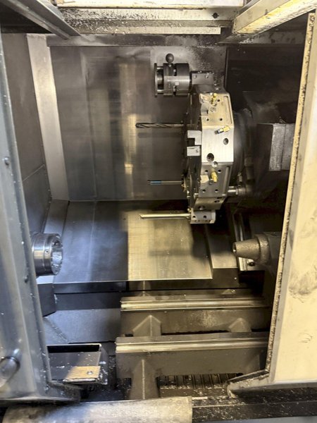 Used 2012 Haas ST-20 CNC Lathe with Bar Feeder For Sale