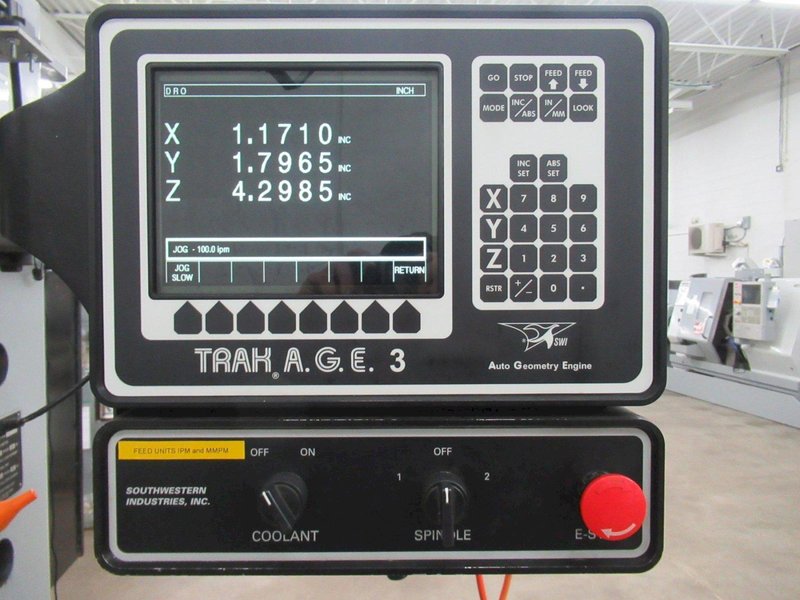 Southwest Industries Trak DPM 3-Axis CNC Vertical Bed Mill w Trak A.G.E 3 3-Axis CNC Control, Kurt Power Draw Bar, 10" x 50" T-Slotted Table and MORE!