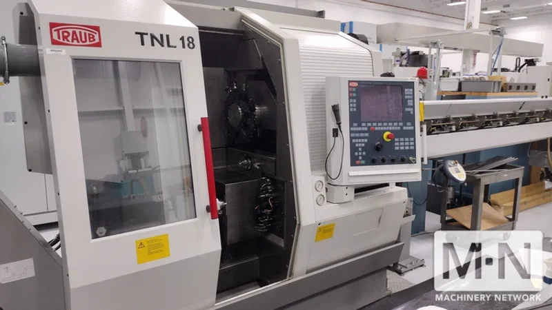 TRAUB TNL 18-7 CNC Swiss Lathe, 2012 w/ FMB Bar Feeder (7-Axis)