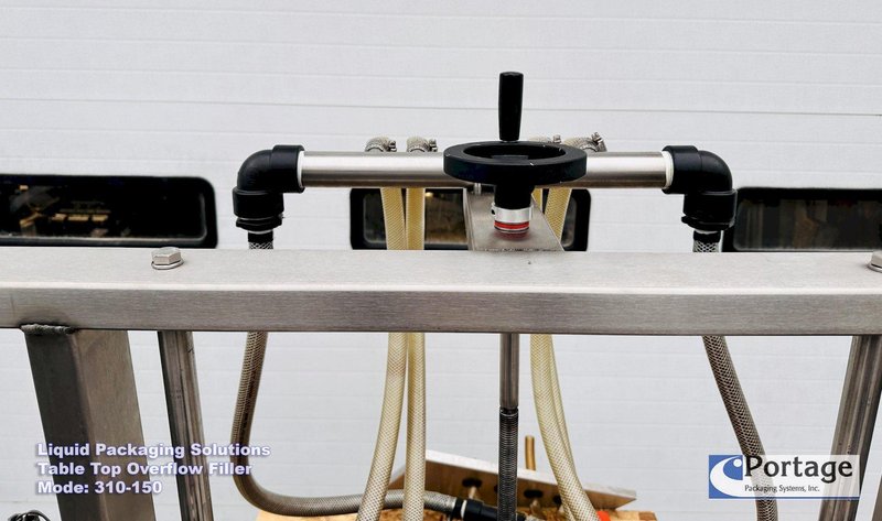 Liquid Packaging Solutions Model: 310-150  ||  Semi-Automatic Table Top Overflow Filler
