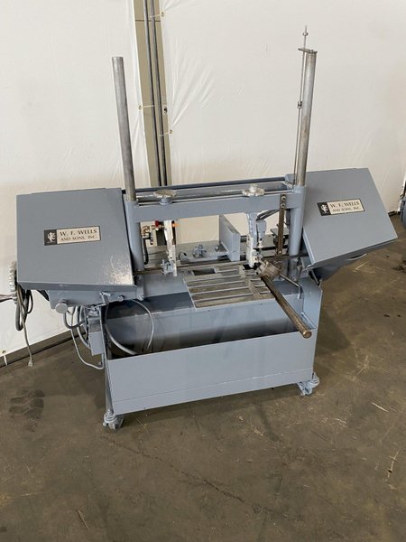 9" x 18" W. F. WELLS HORIZONTAL BANDSAW w/ DUAL COLUMNS. STOCK #0741422.