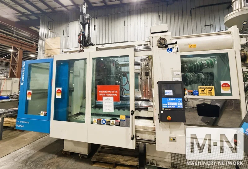 650 TON KRAUSS MAFFEI MODEL CXZL 650-3000/1400/750  THREE SHOT INJECTION MOLDING MACHINE MFG 2010