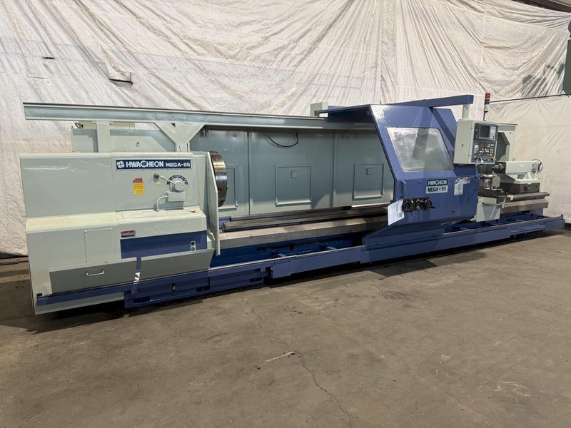 38.6" X 197" HWACHEON MEGATURN 95 CNC 9" HOLLOW SPINDLE OIL FIELD LATHE. STOCK # 0882125