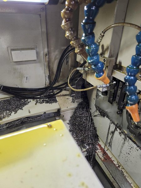 Nexturn SA-38 CNC Swiss Lathe, 38mm, 7-Axis, Turning Length: 8.3", 13 Tools, C-Axis, 8000 RPM, Fanuc 18i-TB, High Press. Coolant, Fire Suppression, Mag. Barfeeder, New 2006