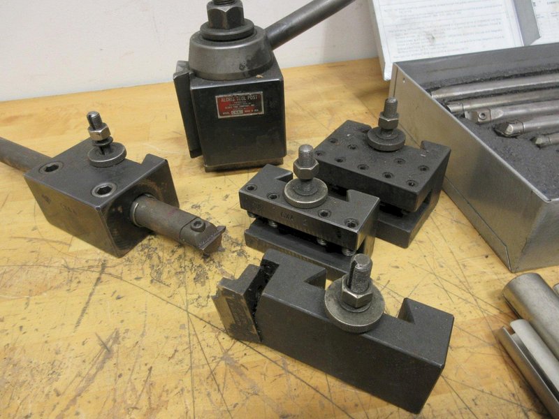 Aloris CXA Tool Post and (4) Assorted Holders, with Everede Tool Co. Boring Bar Set with Sleeves and Cutting Inserts- Auction Item