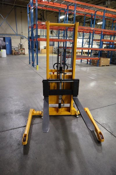 Uline H-5439 Electric Straddle Stacker Lift, 2,200# Cap, 63" Max Height, 50" Between Outriggers, 12 Volt Battery with Charger, 42" Forks- Auction Item