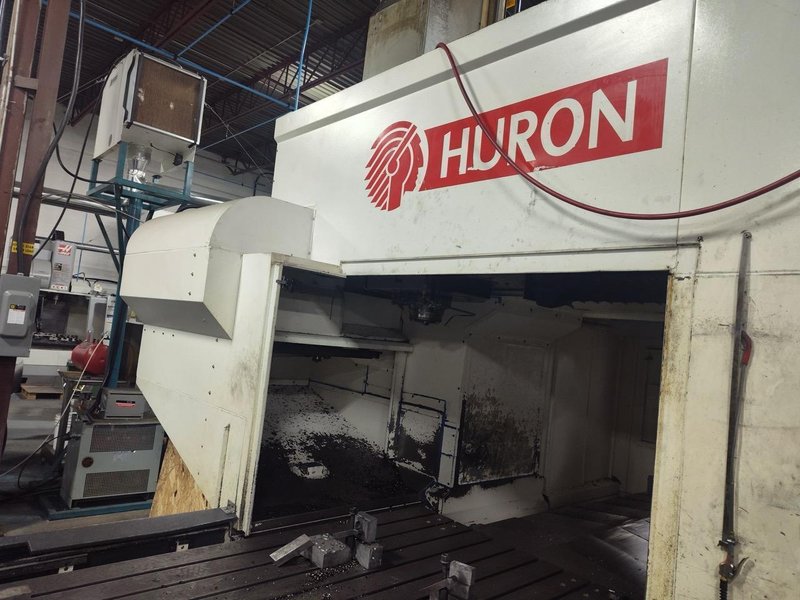 Huron NX40 Double Column Bridge Gantry Machining Center, 2013 – J30 High Pressure Through Spindle Coolant System, Chip Conveyor, Tooling, Siemens Sinumerik Control