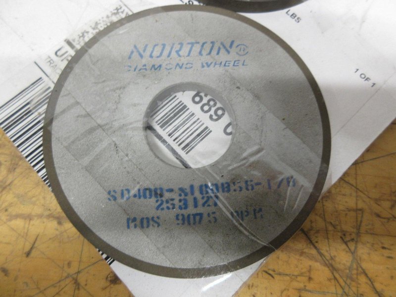 Norton Diamond Carbide Grinding Wheels | (2) Norton 6" x 1/8" x1-1/4" **New**,  (2) Norton 4" x ¼" x 1-1/4"  (1) New &amp;  (1) @ 50%- Auction Item