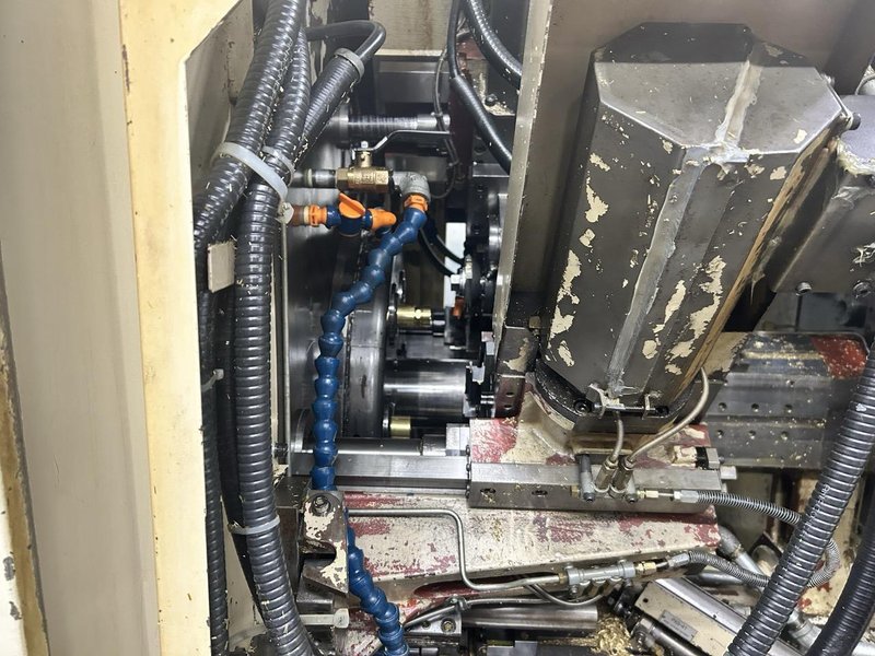 Mitsubishi M-T35E CNC Multi-Spindle Automatic Lathe, 1995 – Chip Conveyor, Bar Feeder