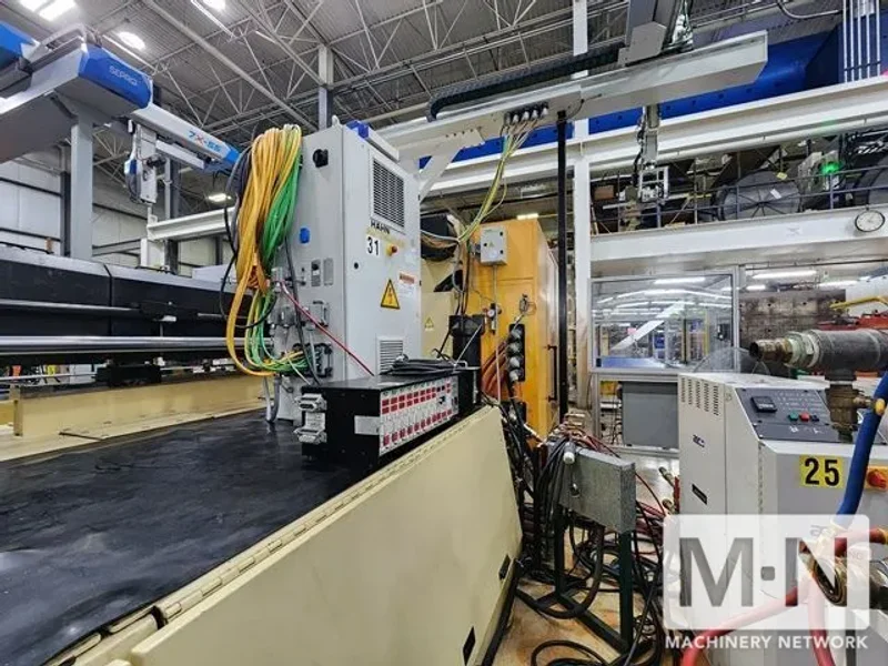 1100 TON 210 OZ HUSKY MODEL H1000RS135-115 INJECTION MOLDING MACHINE MFG 2005