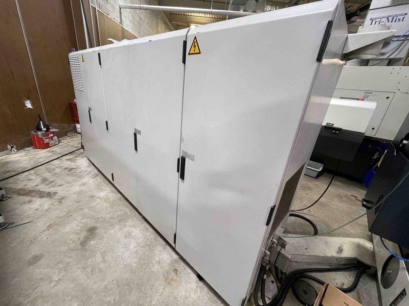 Traub TNL26 CNC Swiss Lathe, 2001- Needs Drive Replaced, Conveyor, 34 Tool Stations