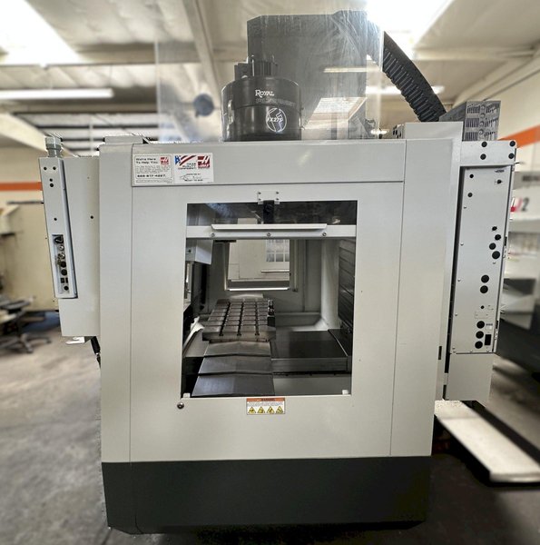 HAAS VM-2 CNC Vertical Machining Center 2011 equipped with quipped with 30"x20"x20" Travels, Haas Control, 4th Axis Drive, 24 ATC Side Mount Tool Changer, Tool Pre-Setter, Cool, Chip Auger