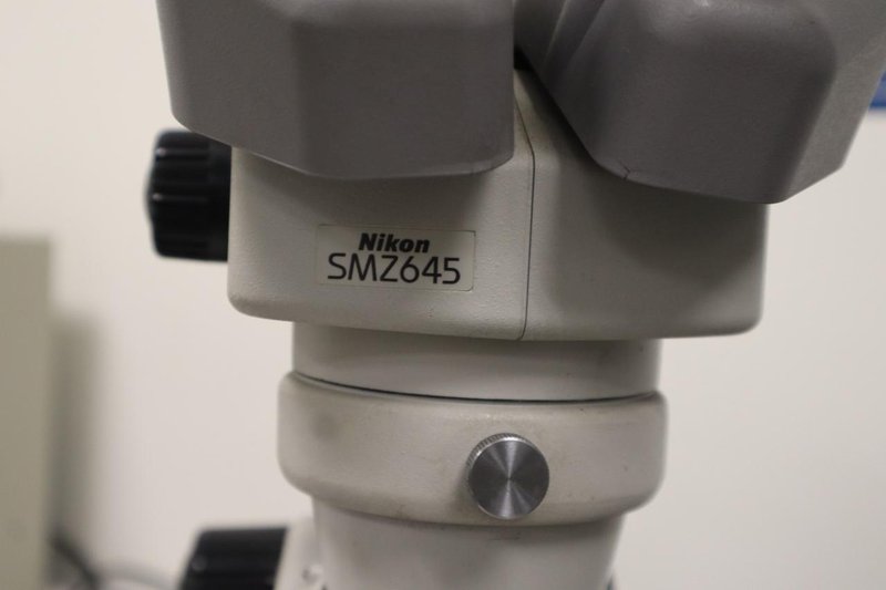 Nikon SMZ645 Stereo Zoom Microscope with Light Ring, .8-5X Zoom, 10X Eyepiece Lenses- Auction Item