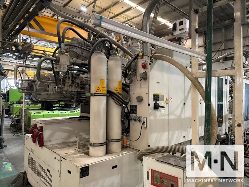 650 TON 58/39.5 OZ KRAUSS MAFFEI MODEL KM650-300-400CKZ 2-COLOR INJECTION MOLDING MACHINE MFG 2010