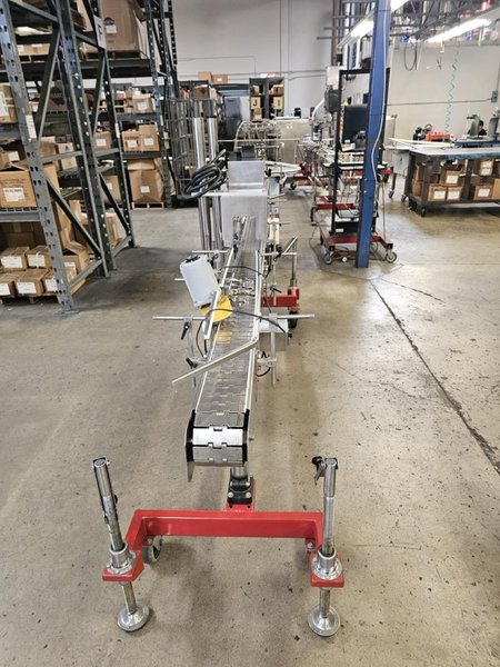 Accutek Bottling Line with Chadam Consultants 2 Head Gravity Filler, Accutek SA-1 Automatic Chuck Capper, Accutek APS106 Labelette Labeler, Everfilt Oil Filtration System, IBC Tanks