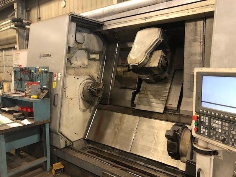 Okuma MacTurn 550W Multi-Axis CNC Lathe, 2008 – Chip Conveyor, Tooling Included