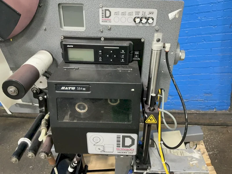ID TECHNOLOGY 14” OUTSIDE DIAMETER / 3” INSIDE DIAMETER CORE PRINT AND APPLY LABELER  -  252
