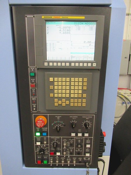 Doosan DNM 500 CNC Vertical Machining Center, 12K RPM Spindle, High Pressure Coolant, Renishaw Probing, Full 4th Axis, Chip Conveyor