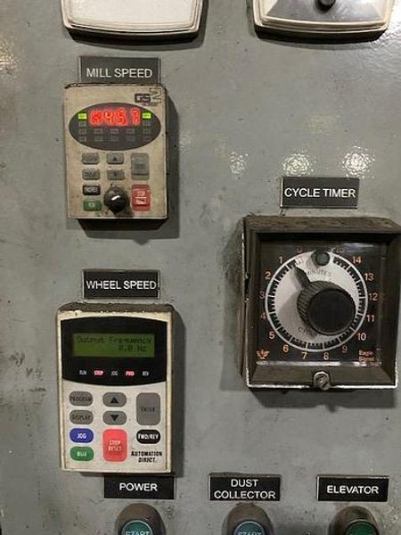 2012 
DeLong 7 super rubber belt tumblast machine rated at 7 cu ft capacity, 20hp direct drive shot wheel, very good condition