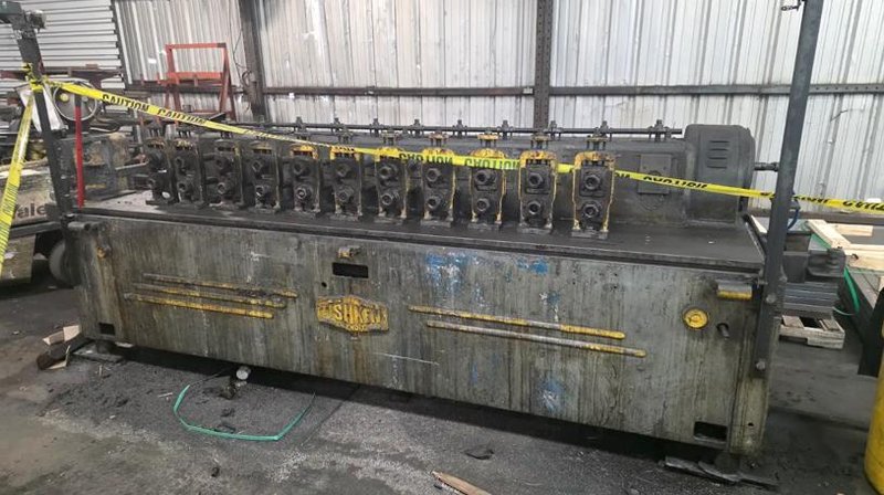 12" STAND X 1.5" ARBOR X 10" ROLL SPACE TISHKEN ROLLFORMER. STOCK # 0329526