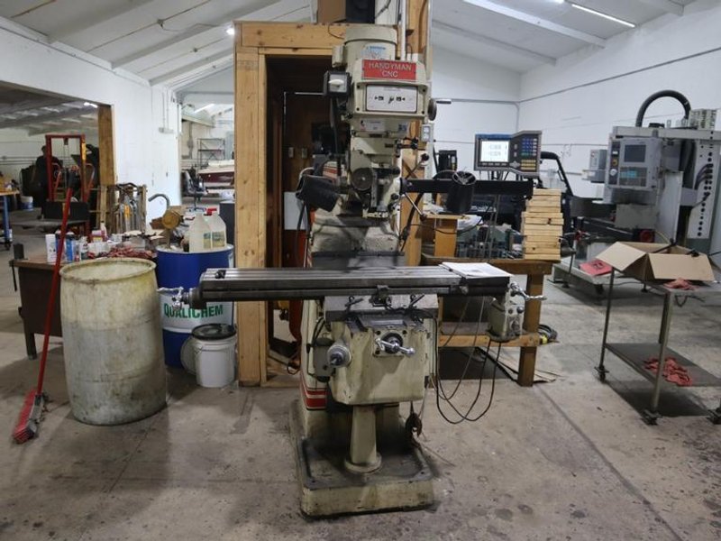 Trionics Handyman Vertical Knee Mill, Variable Speed, Accurite 2 Axis DRO, Power Table Feed- Auction Item