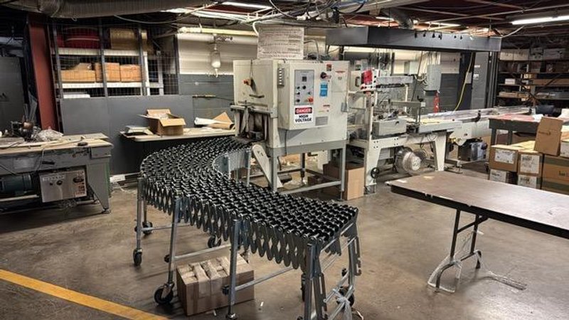 Texwrap 2219 Automatic Shrink Wrapper with Closing Conveyor for Small Product, Extended Lugged Infeed and Texwrap T-1322 Dual Chamber Heat Tunnel, 2001 – Need Gone ASAP