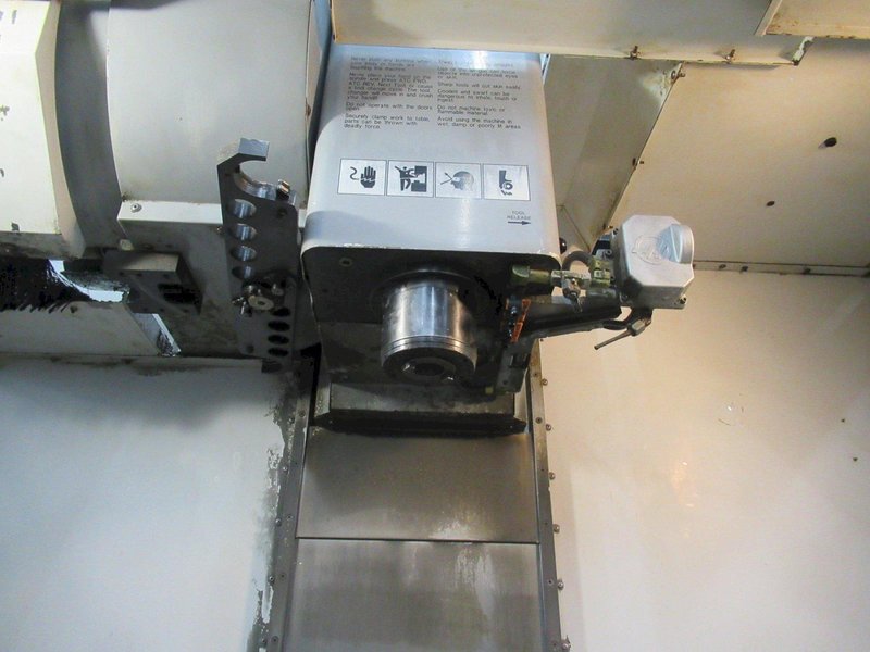 Haas VF-2 CNC Vertical Machining Center with 15,000 RPM CT-40 Spindle, High Speed Machining, Side Mount Tool Changer, 4th Axis Ready, Macros, and Chip Auger.