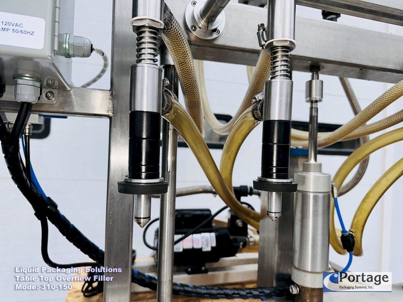 Liquid Packaging Solutions Model: 310-150  ||  Semi-Automatic Table Top Overflow Filler