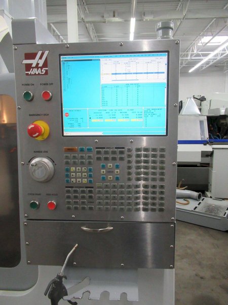 Haas VM-2 CNC Vertical Machining Center w 4th Axis Drive, Chip Auger, Coolant System, Rigid Tapping