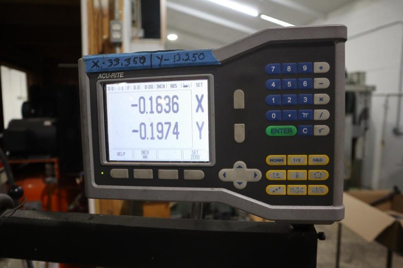 Trionics Handyman Vertical Knee Mill, Variable Speed, Accurite 2 Axis DRO, Power Table Feed- Auction Item