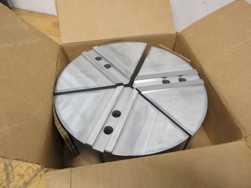 3-Jaw Chuck 1.5mm x 60 Deg Serrated Aluminum Pie Jaws (2 Sets), and Steel Jaws (1) Set- Auction Item