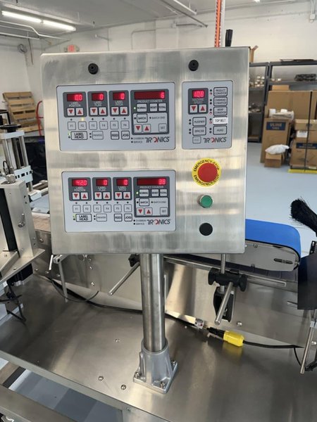 Tronics S30TP Wraparound and Top Labeler, 2018 – Includes Accumulation Table, Coder, Gap Transfer Conveyor