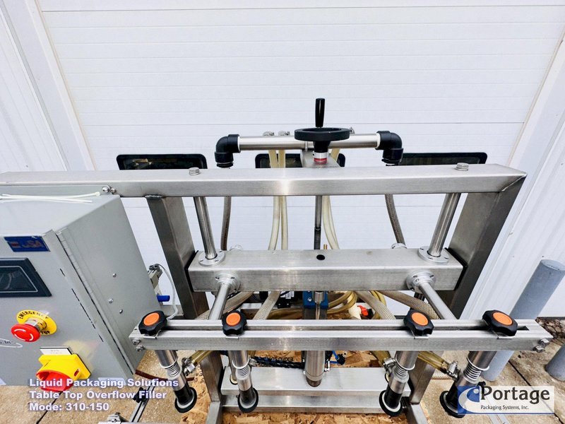 Liquid Packaging Solutions Model: 310-150  ||  Semi-Automatic Table Top Overflow Filler