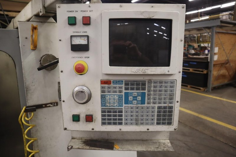 Haas VF-4 CNC Vertical Machining Center, 20 Station Carousel  Tool Changer, 7500 RPM Spindle, Chip Auger, Programmable Coolant- Auction Item