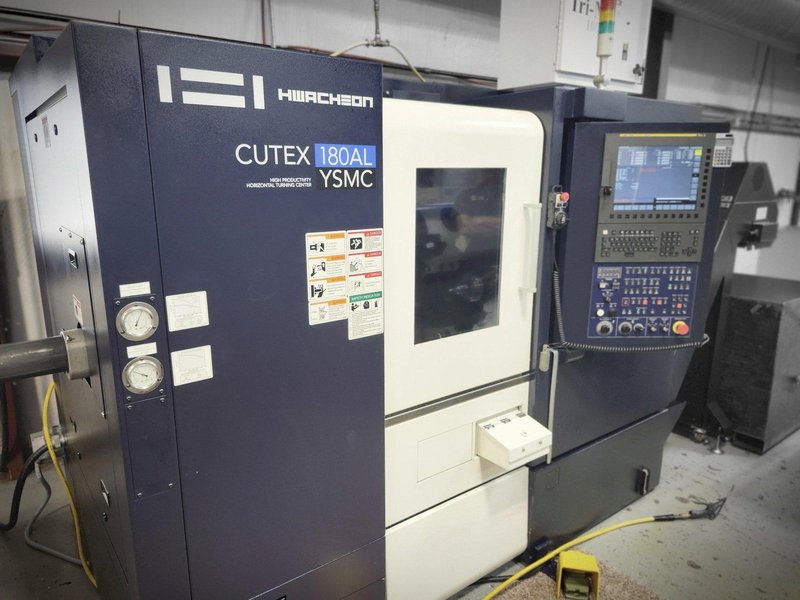 Hwacheon CUTEX-180 YSMC CNC Turning Center, 6000 RPM, Live Tooling, 3-Jaw Chuck, 12 Pos. Turret, Fanuc, Imeca Bar Feeder, New 2021