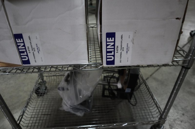 (2) Zebra 110Xi4 Label Printers, 203 dpi, 4&quot; Wide Label Cap - On Wire Cart with Labels- Auction Item