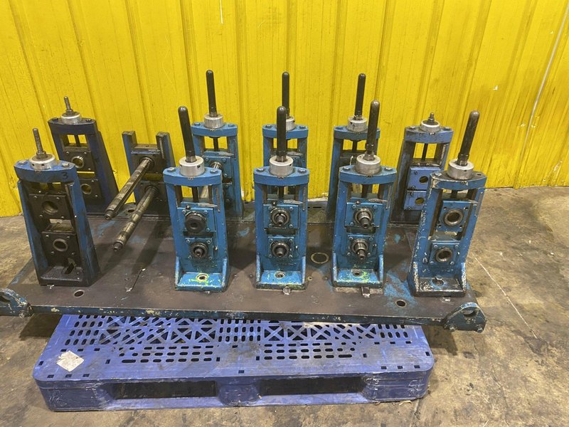 4 STAND X 1.5&quot; X 11&quot; YODER ROLLFORMER STANDS ON 6 STAND RAFTED BASE: STOCK #16781