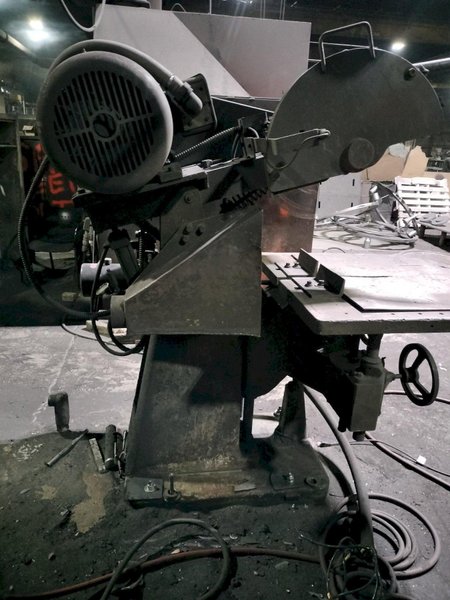 Tabor cut off saw with 25hp motor and power hydrailic assist