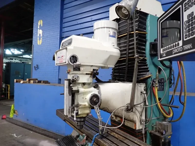 SOUTHWESTERN INDUSTRIES INC 10" X 50" CNC VERTICAL MILL  -  SB3