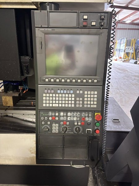 Okuma Genos M560-V VMC, 2021 – 15k Spindle, Chip Conveyor